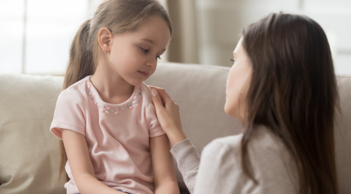 A mom speaking to her daughter.