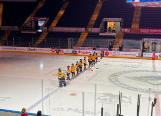 Hockey players on the ice.