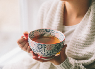 Meet Shannon: Through Time and Space A woman holding a tea cup.