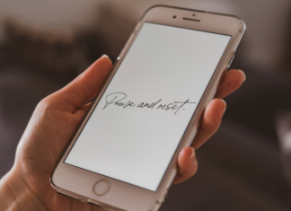 Pressing Pause, and Then Unpressing It "Pause and reset" displayed on a phone screen.