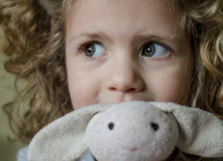 The Bunny That Just Won’t Die A girl with her bunny lovie.