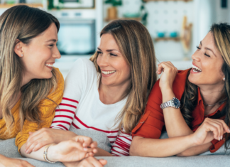 Women friends laughing.
