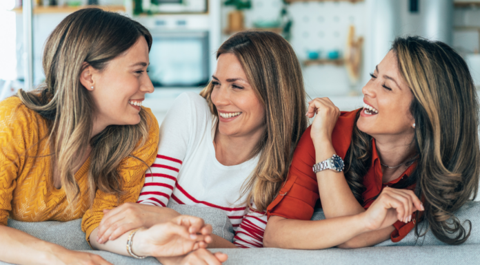 Women friends laughing.