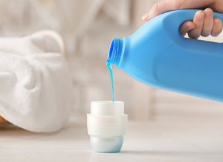 Laundry Experiments: Why I Started Making My Own Detergent (And How You Can Too) Pouring laundry detergent.