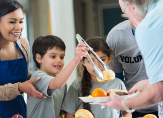 Finding Hope and Humanity in the Heart of the Soup Kitchen Kids helping to serve at a soup kitchen.