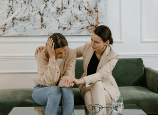 A woman comforting a friend going through divorce.
