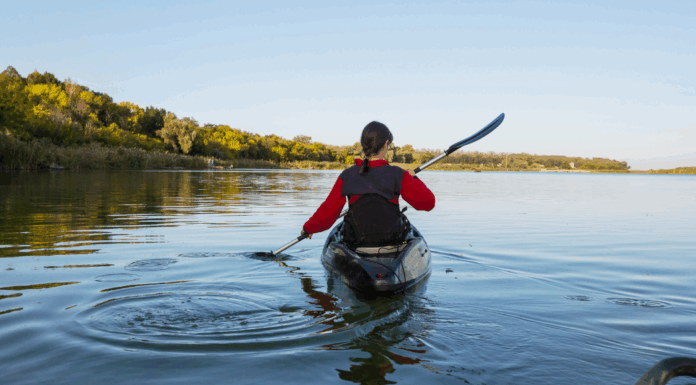 A woman kayaking.