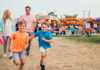 A family at a summer fair.