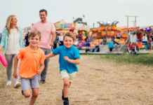 A family at a summer fair.