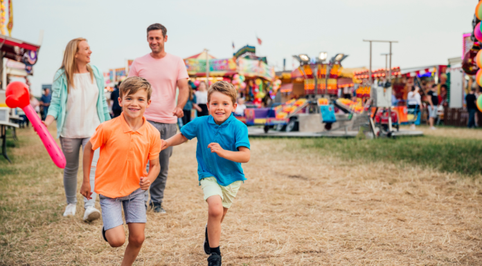 2026 Summer Fairs and Festivals in & Around Fairfield County A family at a summer fair.