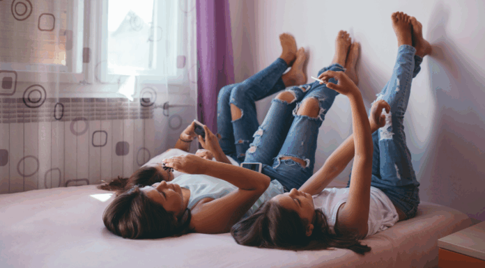 Girls on their phones.