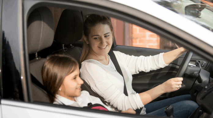 The Tween Chauffeur A woman driving her tween in the car.