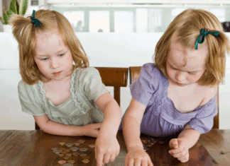 Twins counting change.