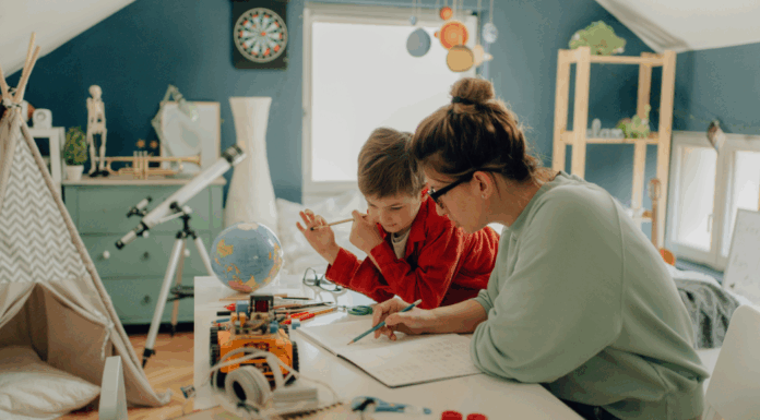 A mom homeschooling her child.