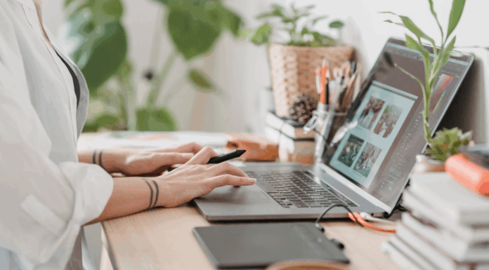 A woman working on her computer.