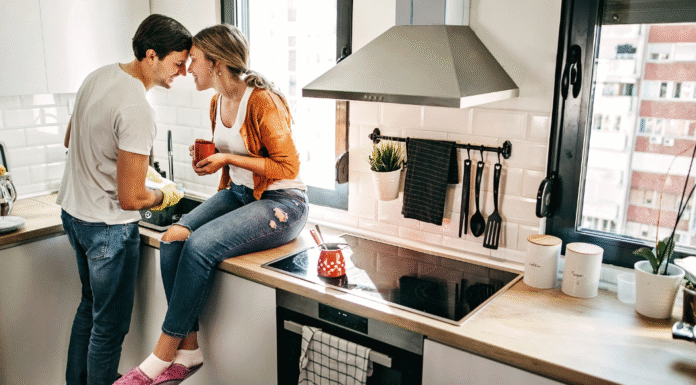 A couple in the kitchen.