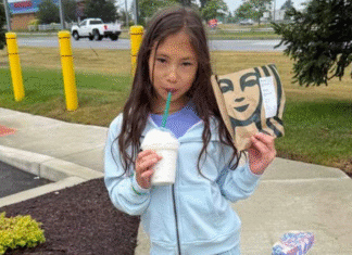A tween drinking Starbucks.