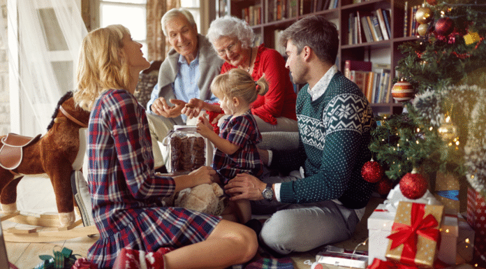 A family opening presents on Christmas.