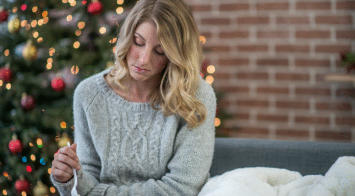 A woman sad during the holidays.