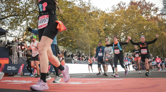 Crossing the finish line at the NYC marathon.