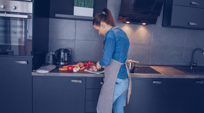 A woman cooking dinner.