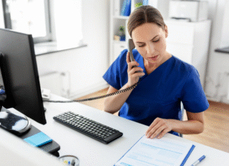 Medical professional making phone calls.