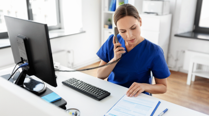 Medical professional making phone calls.