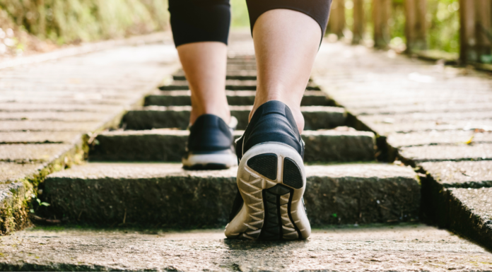 A woman stepping forward.