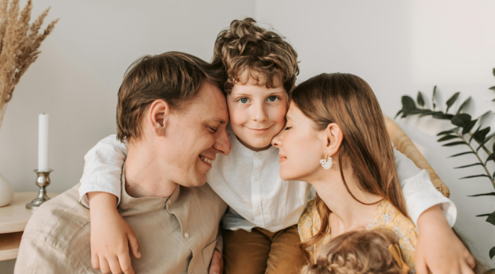 Parents being held by their son.