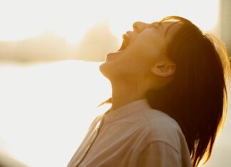 A woman screaming.