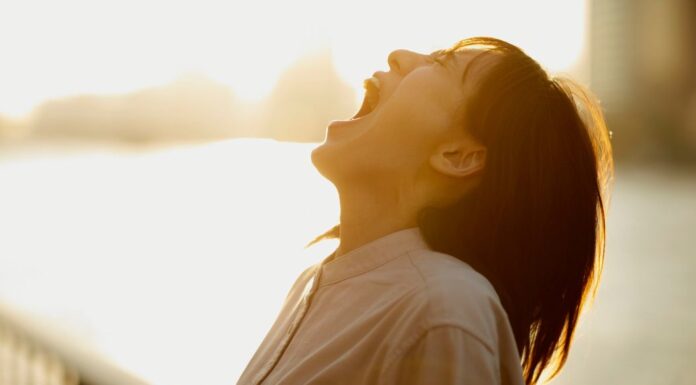 A woman screaming.