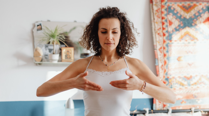 A woman practicing self-love.