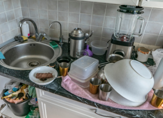 A messy counter of dishes.