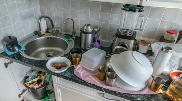 A messy counter of dishes.