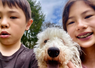 Kids with a dog.