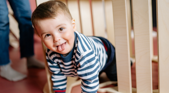 A boy sticking out his tongue.