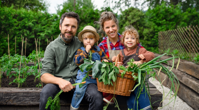 Rooted At Home, Raised for the World A family in their home garden.