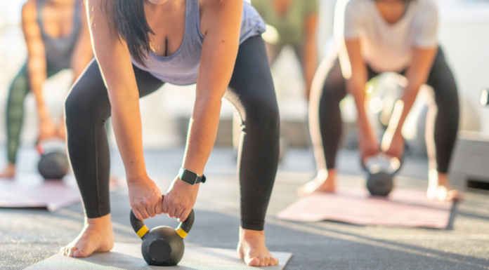 Women lifting weights.