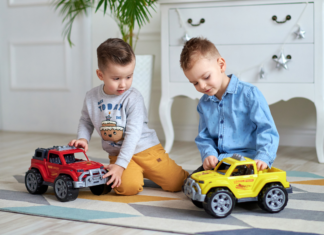 The Friends I Hope My Son Finds Toddler boys playing with trucks.