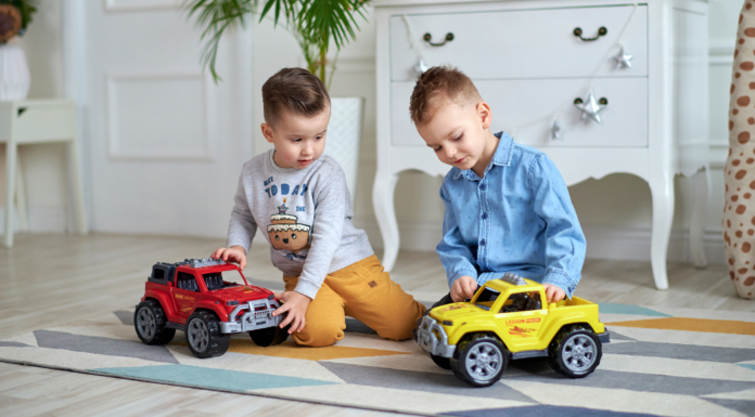 The Friends I Hope My Son Finds Toddler boys playing with trucks.