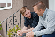 Why “Waiting Until They’re Older” Isn’t Enough: Building Early Prevention Skills Around Alcohol Use A dad talking to his teen son on the front steps.
