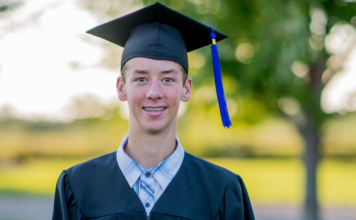 Graduation, How Are We Here? A boy in his graduation cap and gown.