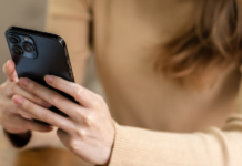 A woman texting.