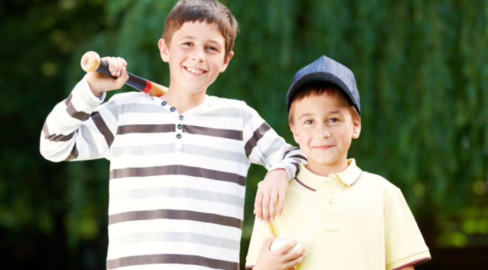 Things the Sandlot Understands About Childhood That Modern Parenting Doesn’t Boys holding a baseball and ball.