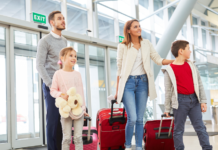 A family walking through the airport.