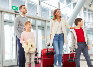 A family walking through the airport.