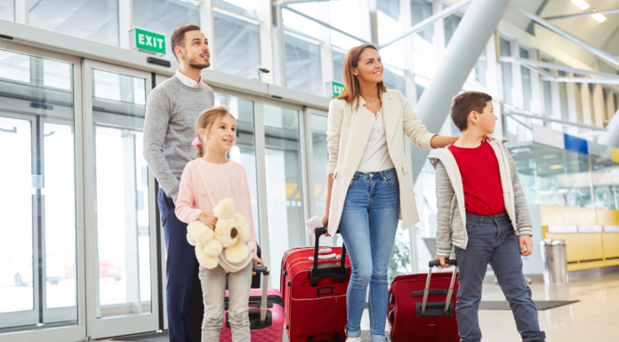 A family walking through the airport.