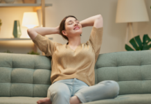 A woman relaxing on the couch.