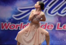 A girl at a dance competition.