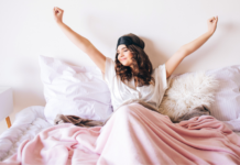 Early to Bed, Early to Rise A woman waking up refreshed.